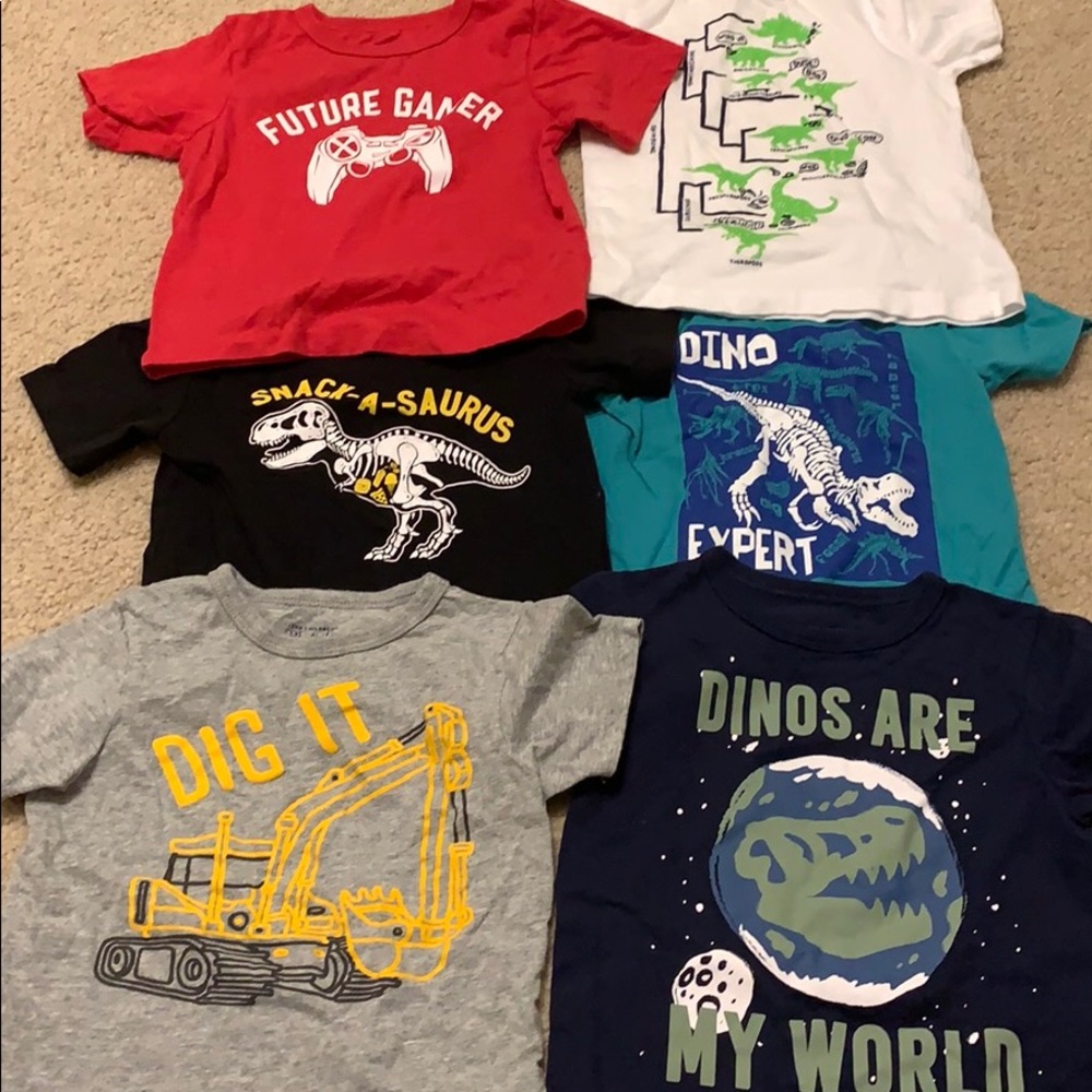 7 graphic tees. Children place